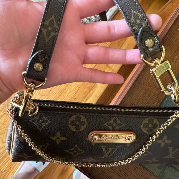 Authentic Louis Vuitton eva.with automatic monogram strap - Picture 9 of 10